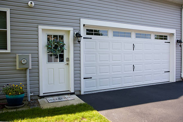 24/7 Emergency Garage Door Panel Replacement experts in Harlan, KY